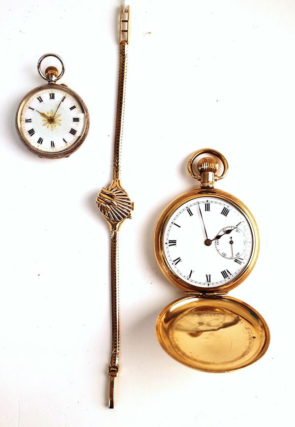 A Rotary 9ct gold lady's bracelet wristwatch, the signed circular silvered dial with gilt Arabic and baton numerals, with a foldover dial cover, on a