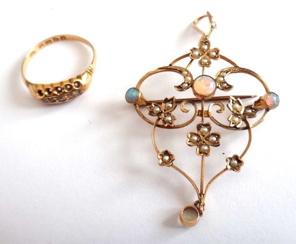 An 18ct gold and diamond five stone ring, mounted with a row of small cushion shaped diamonds, Chester 1910, ring size M and a gold, opal and seed pea