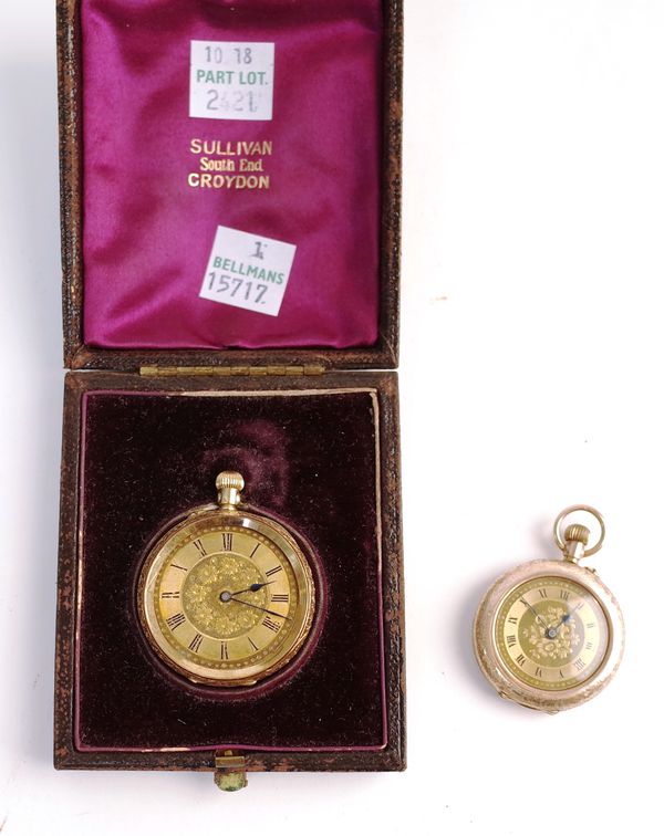 A gold cased lady's keyless wind, openfaced fob watch, with an unsigned cylinder movement, base metal inner case, the floral decorated gilt dial with