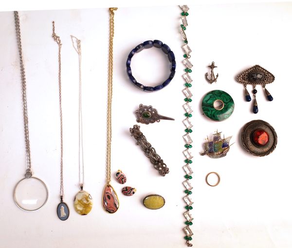 A group of jewellery, comprising; a silver and marcasite bracelet, a lapis lazuli bracelet, three pendants with neckchains, a pair of earclips, a spy