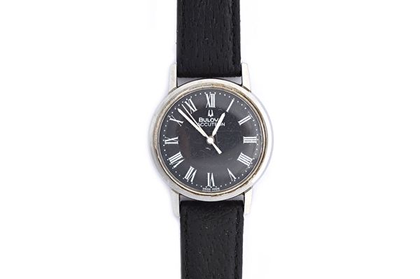 A Bulova Accutron steel circular cased gentleman's wristwatch, the signed black dial with white Roman numerals, white hands and with centre seconds, d