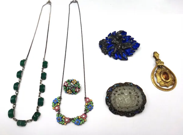 A vary coloured enamel brooch and a vary coloured enamel and marcasite set necklace, each in a floral design, probably by Bernard Instone, a blue enam