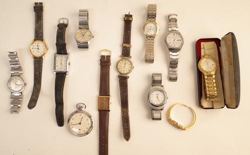 An Accurist gilt metal fronted gentleman's bracelet wristwatch, with the original certificate of guarantee and box, nine further mostly gentleman's wr