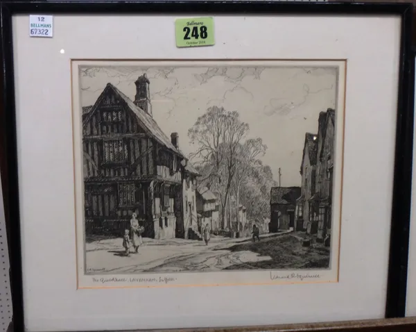 A group of three, including of Biddenden, Kent by Frank Moss Bennett, an etching of the Guildhall, Lavenham by Leonard Russell Squirrell, and an oil p