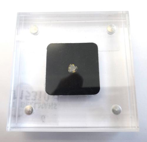 A heart shaped brilliant-cut loose diamond, 0.35ct., fancy deep brown green orange, magnetic perspex case, boxed.This Lot is subject to VAT on the ham