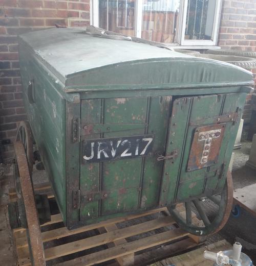 A green painted wooden four wheeled cart, detailed 'City Engineers Dept Highways', with a domed hinged lid and compartmented interior, wooden spoked w