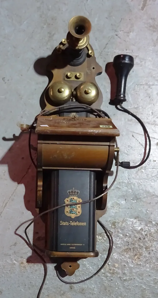 An early 20th century style wall mounted telephone.   S4T