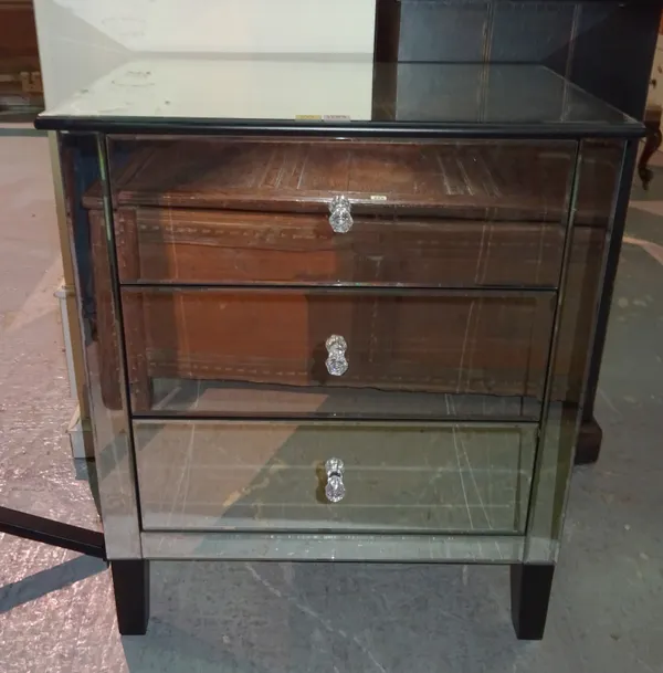 A 20th century mirrored glass veneered dressing table, with single frieze drawer on tapering square supports, 98cm wide x 84cm high x 52cm deep.  J9