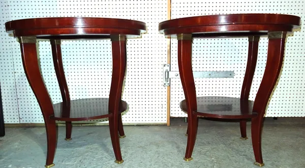 A pair of 20th century mahogany circular occasional tables, 75cm wide x 75cm high. D4