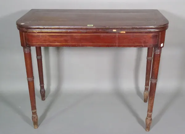 A Regency mahogany brass inlaid card table on ring turned tapering supports, 92cm wide x 77cm high.   C8