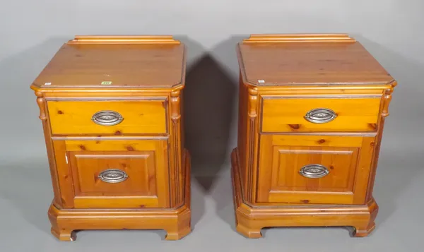 A pair of 20th century pine bedside chests with single drawer over cupboard base, 50cm wide x 66cm high.   G7