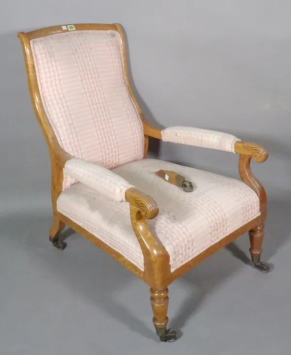 A mid-19th century French walnut open armchair on tapering turned supports, (a.f).  D7