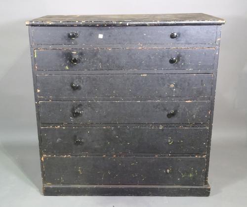An early 20th century black painted chest of six graduated long drawers, 95cm wide x 100cm high.  D10