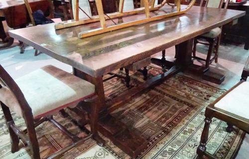 A 20th century oak refectory table on block down supports and stepped base,198cm wide x 102cm deep x 74cm high.   E4