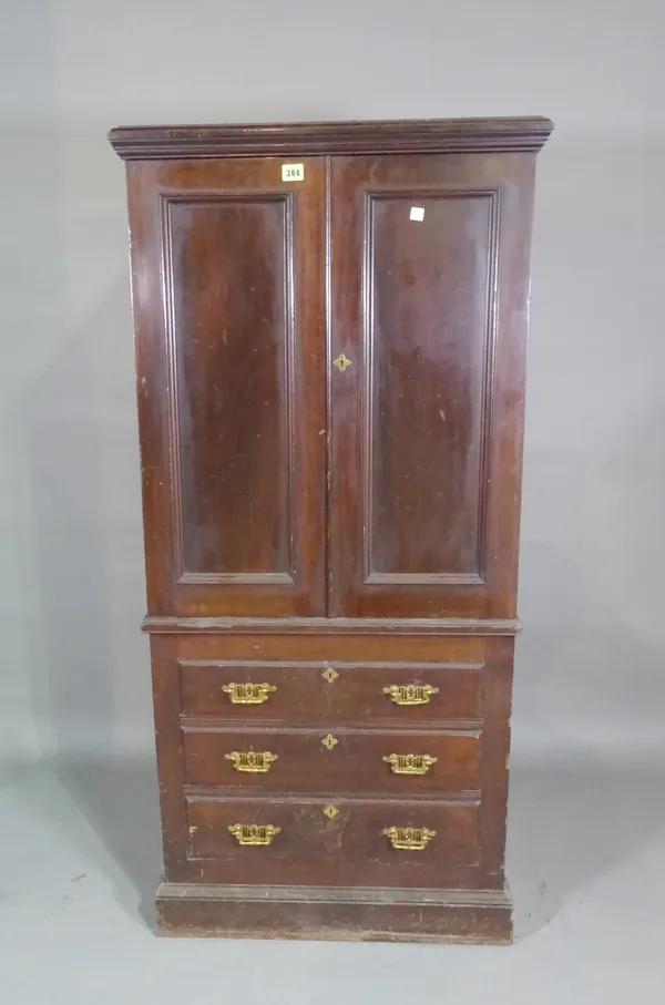 A 19th century mahogany safe cabinet over three drawers on plinth base, 66cm wide x 142cm high.   D10