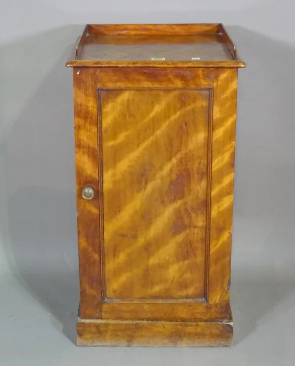 A 19th century mahogany bedside cupboard with galleried top on plinth base, 41cm wide x 79cm high.   I9