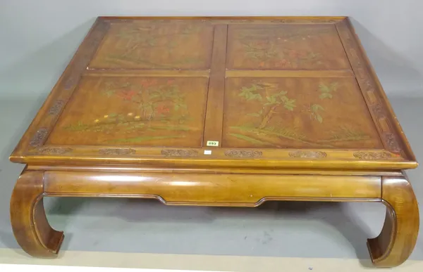 A 20th century Chinese hardwood low coffee table with four inset panels depicting birds, 109cm wide x 49cm high.  F7