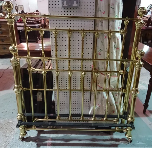 An early 20th century brass single bed, 120cm wide x 140cm high.  J10
