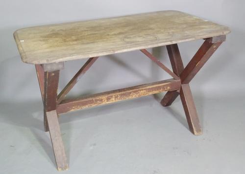 A 19th century mahogany and pine rectangular side table with 'X' frame base, 60cm wide x 120cm long.   F5