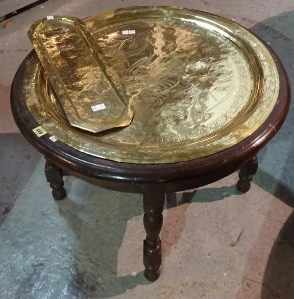 A 19th century mahogany circular side table with inset circular brass tray, 73cm wide x 52cm high and a smaller rectangular brass tray, 51cm wide, (3)