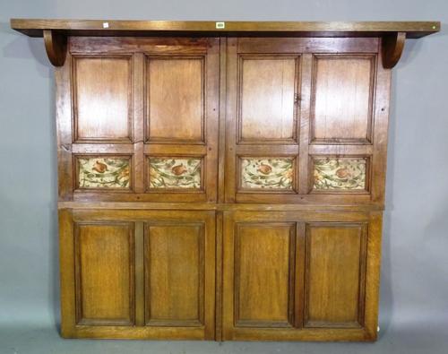 A 19th century oak hanging panel with floral tapestry inserts, 166cm wide x 139cm high. EXTRA