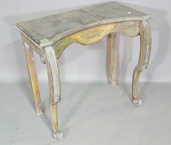 A Continental painted concave side table on scroll supports, 65cm wide x 60cm high.   C7