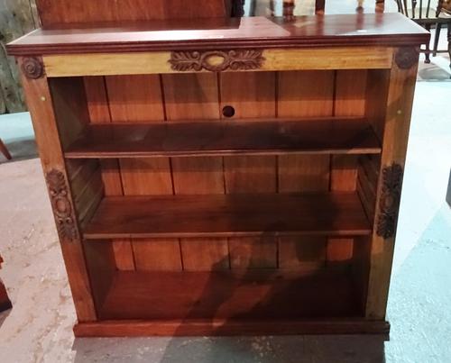 A Regency style oak open bookcase with acanthus moulded decoration, 92cm wide x 86cm high.   G8