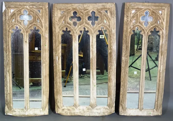 A group of three 20th century plaster Gothic arch top mirrors, 32cm wide x 84cm high.   D10