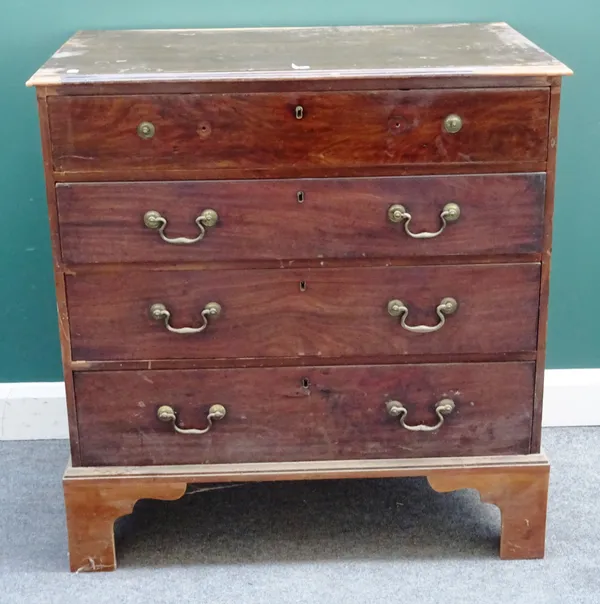 A George III mahogany chest with four long graduated drawers, on bracket feet, the top drawer with fitted interior, 95cm wide x 99cm high x 58cm deep.