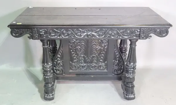 A 19th century and later ebonised rectangular centre table with pair of frieze drawers on turned and reeded columns united by pierced lyre shaped stre