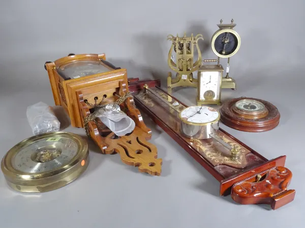 A small oak cased Staart clock, a  brass lyre shape fusee skeleton timepiece movement, a walnut cased aneroid barometer, a brass case wall barometer,