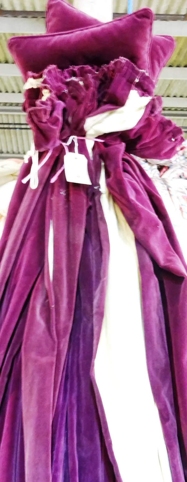 Curtains; a pair of purple velvet lined curtains, 180cm wide x 210cm drop and another pair 84cm wide x190cm drop, and two cushions, (6).   D5