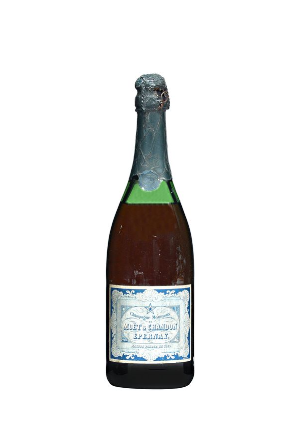 One bottle of Moet & Chandon Epernay champagne, blue label. (Level at high shoulder). Illustrated