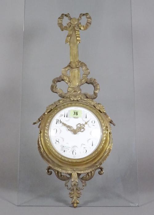 A French cartel clock in gilt metal case. 20cm wide, 60cm tall.  CAB
