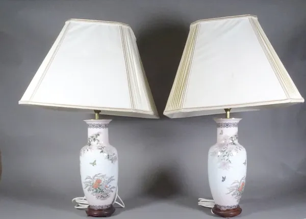 A pair of 20th century Chinese porcelain baluster vases converted to lamps, 35cm high. (2).   CAB