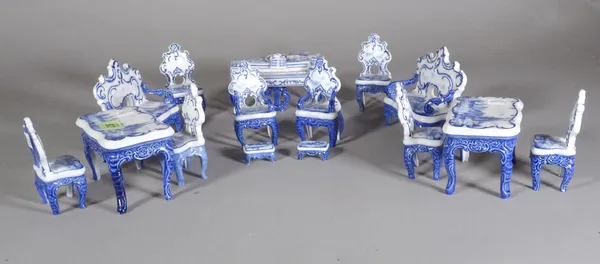 A suite of 20th century Dutch miniature porcelain tables and chairs, (qty). S2T