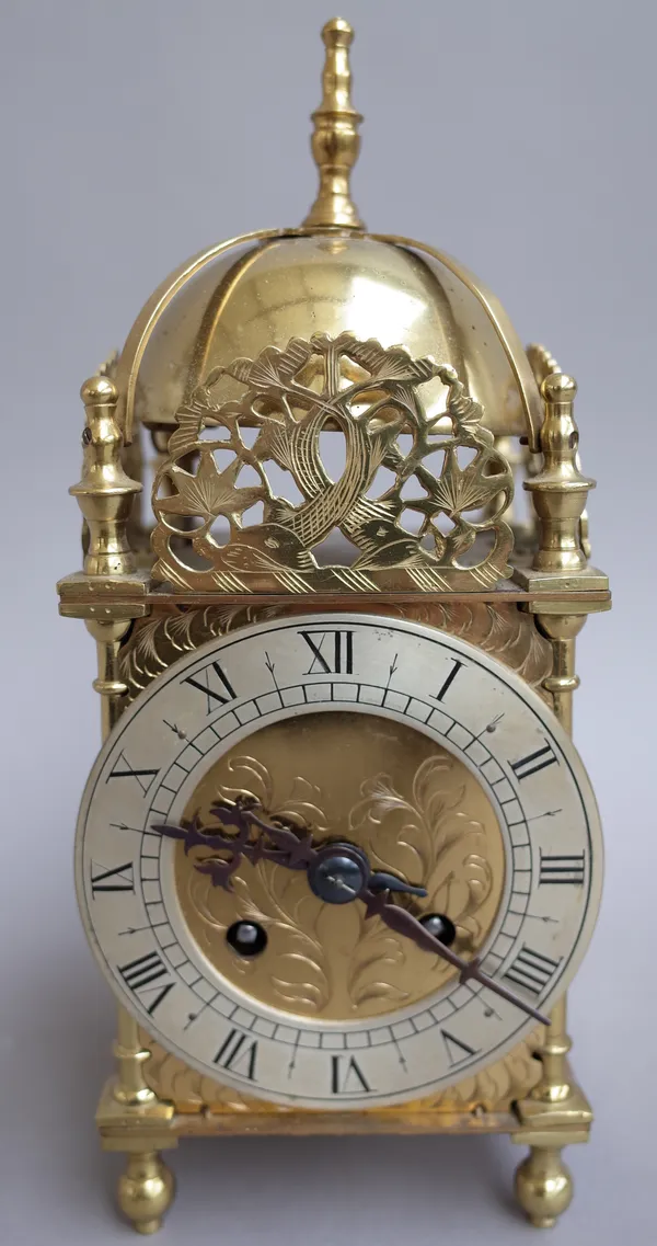 A 17th century style brass lantern clock, with French 8 day movement, 25cm high.