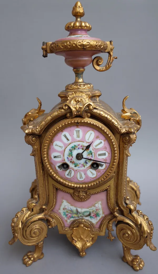 A late 19th century French gilt metal and porcelain mounted 8 day mantel clock (35cm high), (key & pendulum) and a pair of late 19th century French br