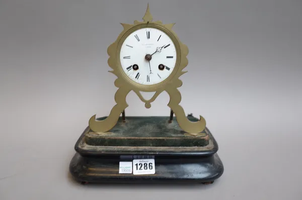 A French brass mantel clock with enamel dial detailed 'Hausburg Paris', 18cm high, a miniature brass and champlevé longcase clock, 30cm high and a Fre