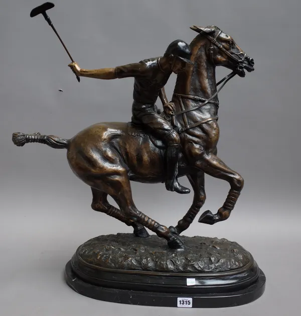 A modern patinated bronze polo player, modelled sitting on his pony, mallet raised, signed 'Joe' to the naturalistic base, on a shaped marble plinth,