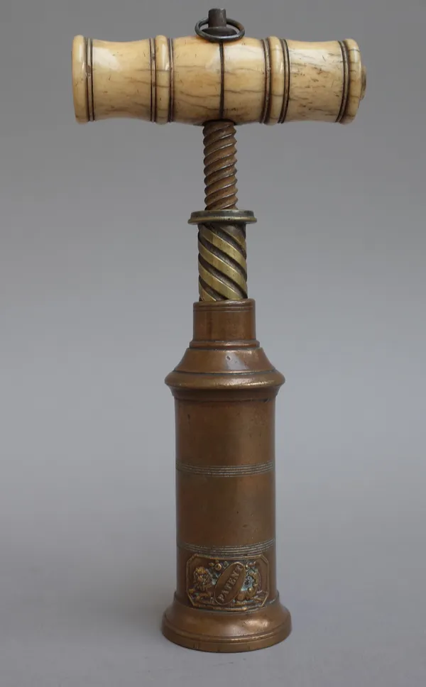 A Thomason type brass barrel corkscrew, early/mid-19th century, with turned handle and 'PATENT' plaque, 25cm long fully extended.