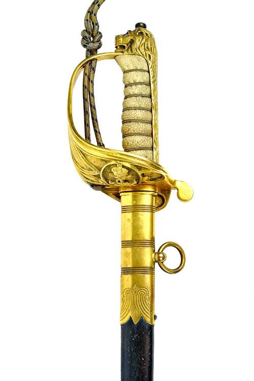 An English George VI Naval officer's sword by Gieves Ltd, the straight polished and engraved blade (80.5cm), detailed GIEVES LTD LONDON PORTSMOUTH & D