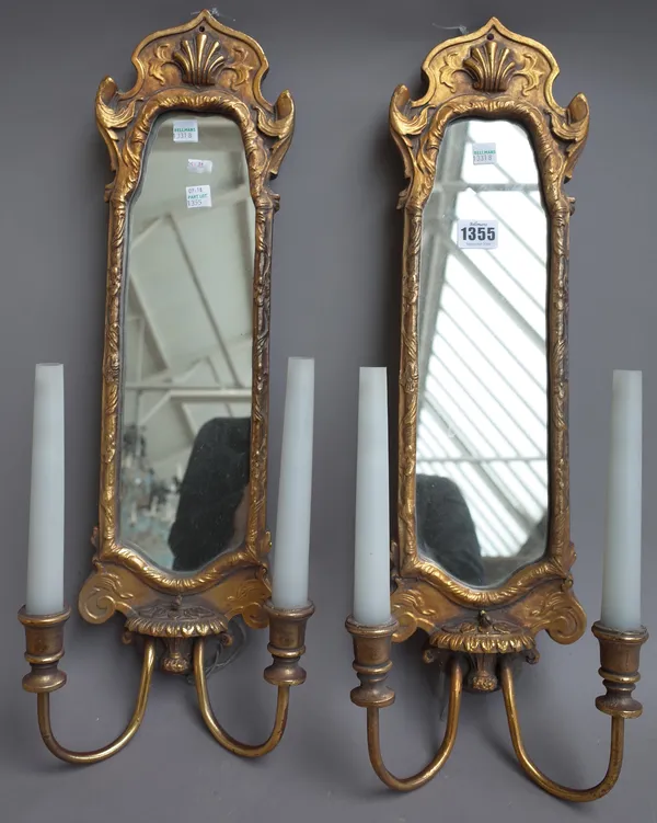 A pair of George I style gilt twin branch girandole mirrors, 57cm high, and a pair of 19th century stripped pine acanthus cresting elements, (4).