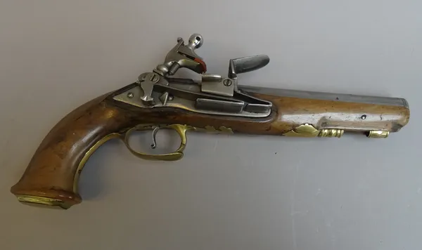 A Continental early 19th century Miquelet flintlock pistol, with circular steel barrel, plain lockplate and brass hardware, (a.f), 32cm overall.