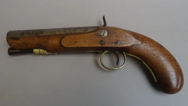 An early 19th century percussion overcoat pistol by Trulock & Son, Dublin, converted from flintlock, octagonal steel barrel, wooden ramrod, foliate en