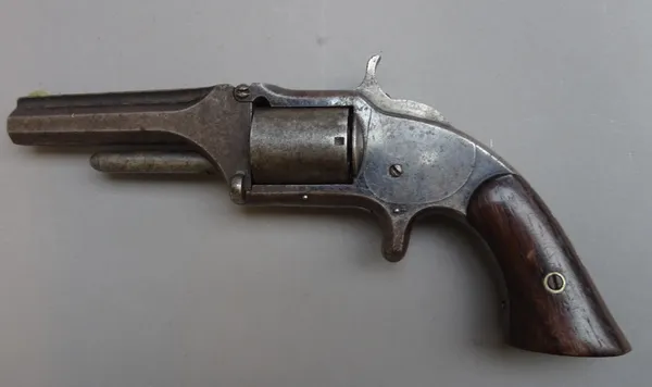 A Smith & Wesson .32 (rim fire) five shot single action revolver, model 1 1/2 first issue, serial No 20657, circa 1866, with octagonal tip-up 3 1/2 in