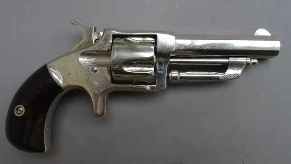 A Wesson & Harrington .32 calibre, five shot, single action revolver, late 19th century, nickel finish, octagonal barrel engraved with maker's details