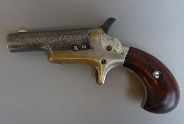 A Colt No 3 .41 calibre derringer, late 19th century, stamped 'COLT' to the circular barrel, plated brass frame, sheath trigger and two piece wooden g