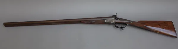A double barrelled pinfire shotgun by E. Bond, London, with side by side Damescene barrels, foliate engraved lockplate, a chequered walnut grip and fu