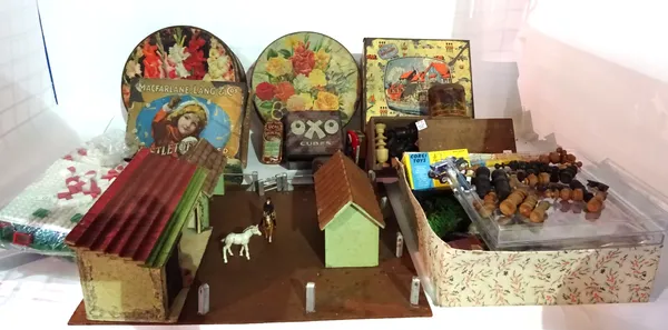 Toys, including; a 20th century wooden chess set, a quantity of miniature farmyard items, advertising tins and sundry, (qty).  S3M